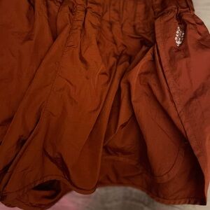 FP Movement by Free People High Waist Shorts in Rust